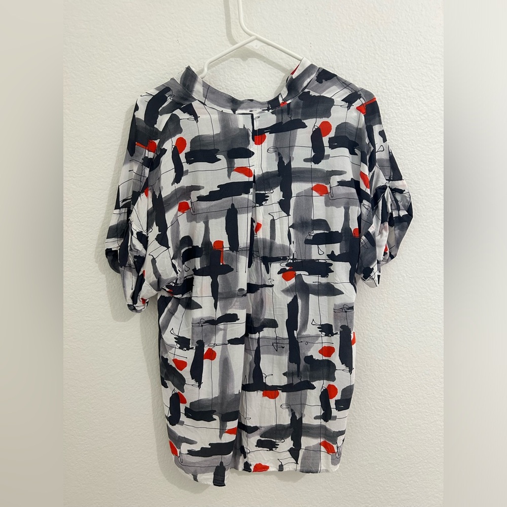 Blouse with asymmetric design